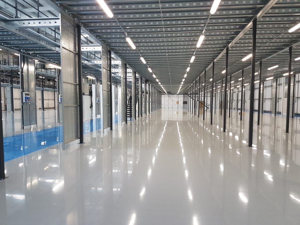 Fit-out of industrial unit, including office and ancillary spaces, for a laser sintering manufacturing facility

Mechanical services include domestic cold water, local hot water, BEMS, compressed air pipework, gas-fired boiler serving CT and VT circuits, unit heaters, sweep fans, VRF system and MVHR systems.

Electrical services include LV distribution, low energy lighting, daylight linked lighting controls, security, power and data installations.

Mechanical and Electrical Full Design and Site Monitoring Services